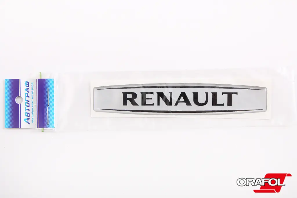 наклейка Эмблема силикон Renault серебр. фон, черная 2*12см 