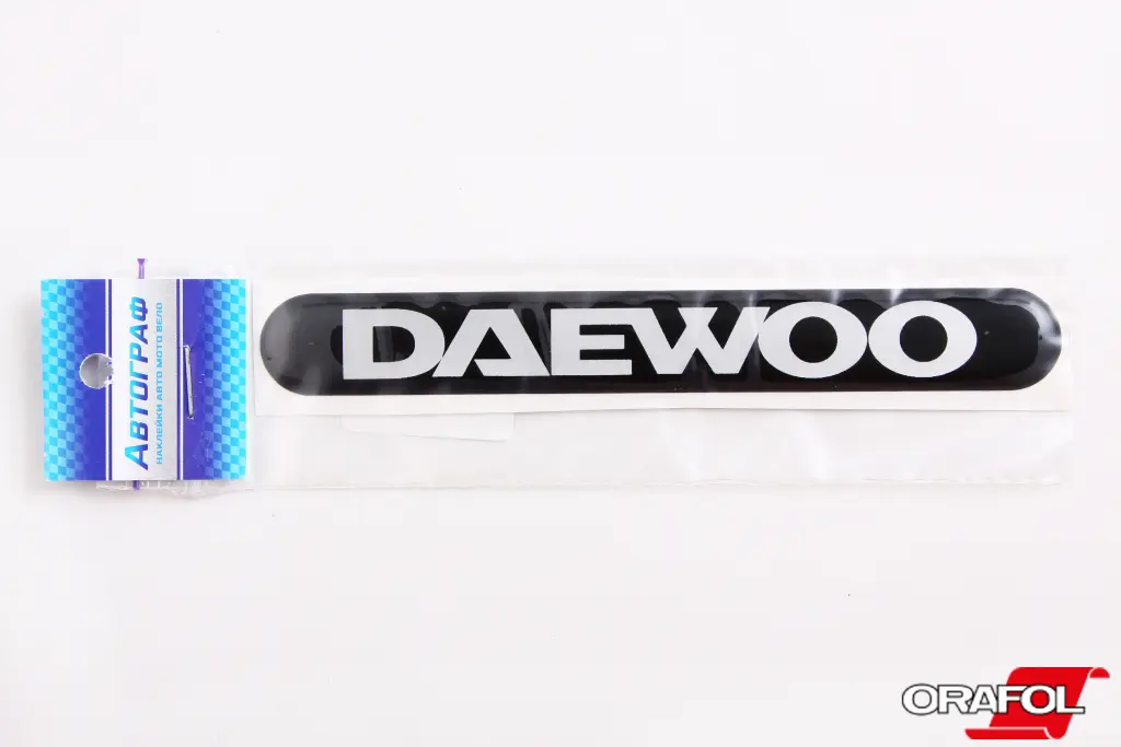 наклейка Эмблема силикон Daewoo черный фон, серебр. 2*14см 