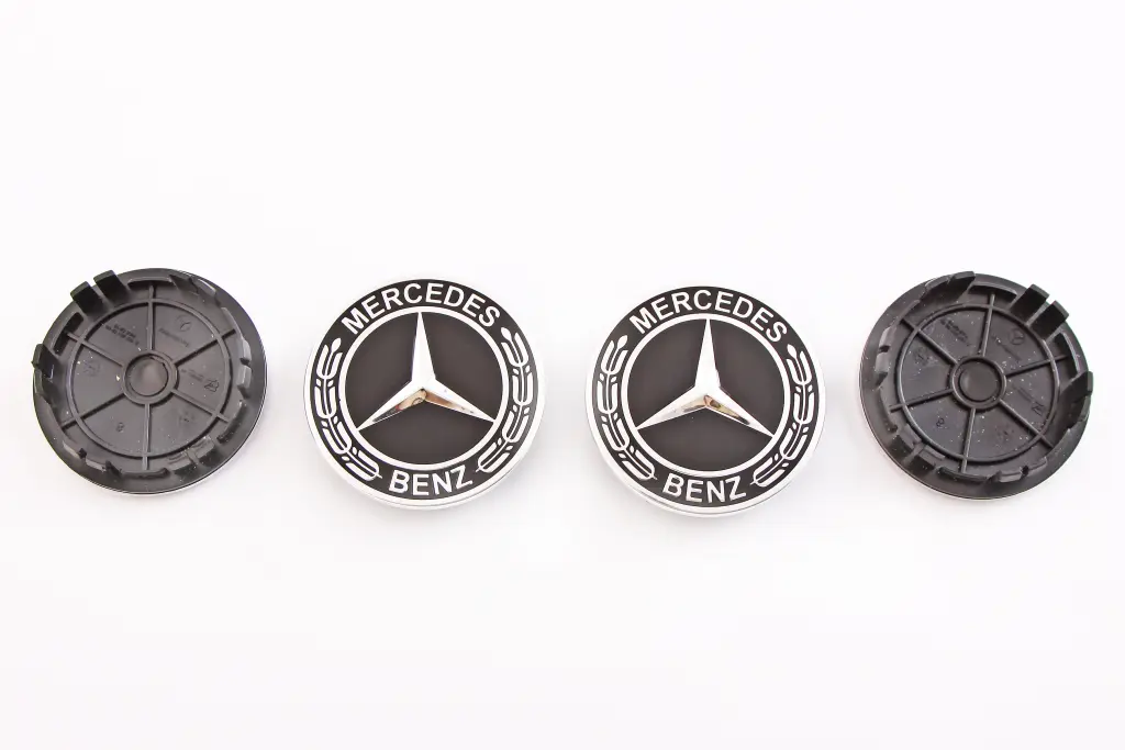 заглушка диска 75*66мм Mercedes чорна 6 ніжок (4 шт.)