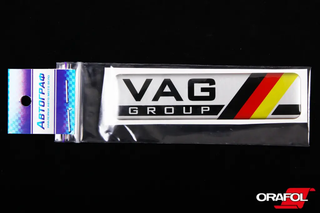 наклейка Эмблема силикон VAG Group 3*10см 